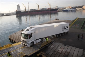 Heavy goods vehicle boarding ferry at Port of Algeciras, Spain, Europe