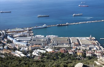 View over docks and shipyard warehouses in Gibraltar, British territory in southern Europe