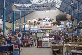 Flea market inside Market Hall building, Abergavenny, Monmouthshire, South Wales, UK
