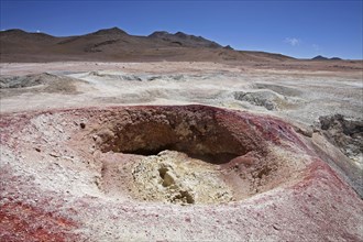 Mud lakes and steam pools with boiling mud in geothermal field Sol de Manana, Altiplano, Bolivia,
