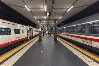 Two waiting trains at Genova Piazza Principe station, in the evening, Piazza Acquaverde, Genoa,