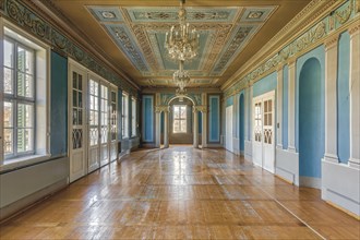 Empty historic room with wooden floor and richly decorated blue walls and ceiling, Schachtrupp