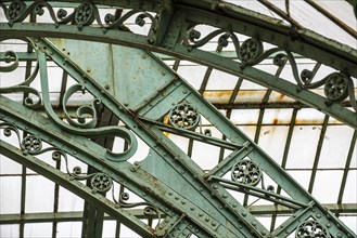 Detail of decorated wrought-iron truss of the Royal Greenhouses of Laeken in Art Nouveau style,