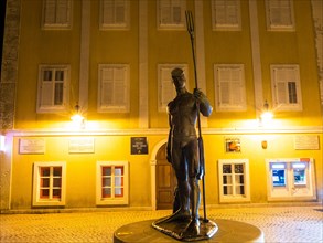 Monument, diver with trident, night shot, harbour of Mali Losinj, island of Losinj, Kvarner Gulf