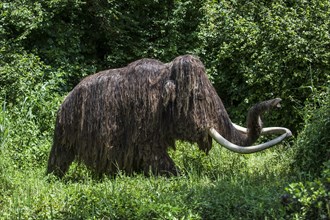 Replica of prehistoric woolly mammoth (Mammuthus primigenius) at the Grottes du Roc de Cazelle,