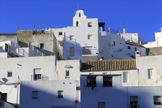 Pueblo blanco historic village whitewashed houses on hillside, Vejer de la Frontera, Cadiz