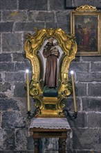 Figure of a saint in a gold frame in the church of San Donato, Via S. Donato, 10, in the centre of