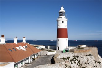 Red and white striped lighthouse at Europa Point, Gibraltar, British terroritory in southern Spain,