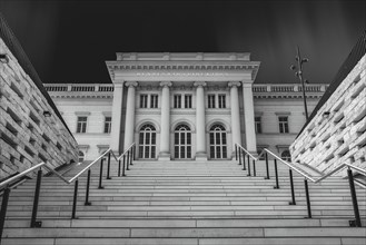 Monochrome image of a historic building with columns and staircase, Federal Railway Headquarters,