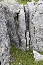 Close up of joints in carboniferous limestone enlarged by chemical weathering, Yorkshire Dales