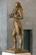 Bronze statue of the violinist Niccolo Paganini by the artist Niccolo Tommaseo, entrance hall of