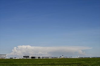 Overview airport with thundercloud in storm front in the background, Munich Airport, Upper Bavaria,