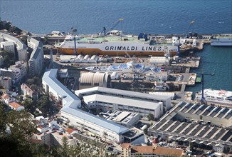 View over docks and shipyard warehouses in Gibraltar, British territory in southern Europe