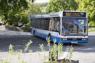 The Craven Connection public transport bus service, in Clapham village, Yorkshire Dales national