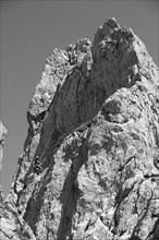 Climber abseiling on the Rosssteinnadel, mountaineering village Kreuth, Mangfall mountains,