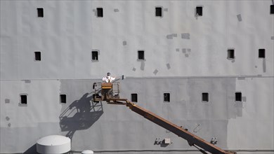 RFA Mounts Bay ship in dry dock being painted, Falmouth, Cornwall, England, UK