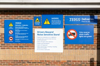 Signs informing delivery drivers of rules at Tesco store, Hungerford, Berkshire, England, UK