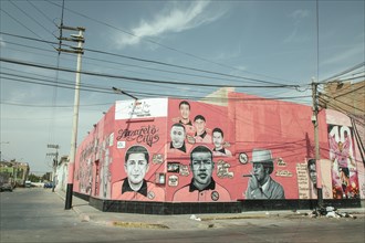 Graffito, portraits of various salsa musicians in the historic centre of Callao, Peru, South