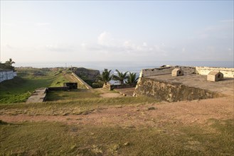 Coastal scenery and historic walls of the fort, Star Bastion, Galle, Sri Lanka, Asia looking south,