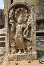 Carved stone figure, The Quadrangle, UNESCO World Heritage Site, the ancient city of Polonnaruwa,
