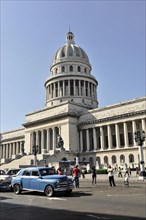 Vintage car from the 1950s in front of the Capitolio Nacional, a building in the neoclassical