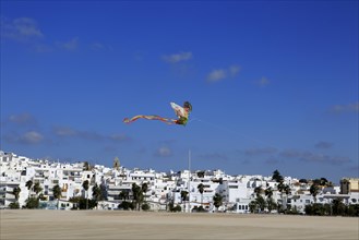 Kite flying above sandy beach at Conil de la Frontera, Cadiz Province, Spain, Europe