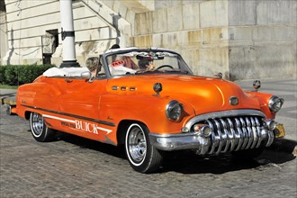 Open-top vintage car from the 1950s in the centre of Havana, Centro Habana, Cuba, Greater Antilles,