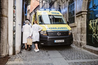 April 17, 2023, Porto, Portugal: Ambulance on the historic street in downtown
