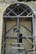 Wooden construction to support arch in medieval castle Chateau de Lavardens in the Midi-Pyrenees,