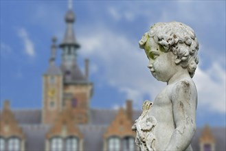 Angel statue in front of Ooidonk Castle, Kasteel van Ooidonk, 16th century Flemish Renaissance