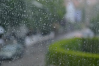Raindrops on the window pane, Munich, Bavaria, Germany, Europe