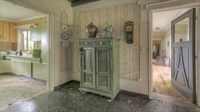 View into an abandoned house with antique clock and furniture, Maison Limmi, Lost Place, Kalken,