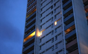 Illuminated flat in a tower block in Gropiusstadt. The rise in rents in German cities has increased