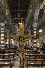 Cross of Christ at the entrance to the church of San Donato, 12th century, Via S. Donato, 10, in