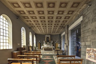 Newly built prayer room in the Romanesque Chiesa Parrocchia Abbazia di San Stefano, mentioned in