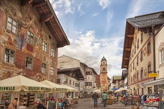 Obermarkt, historic houses with Lueftlmalerei, shops, pedestrian zone, St Peter and Paul church at