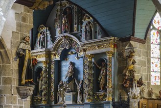 Left side altar in Baroque style, Enclos Paroissial enclosed parish of Guimiliau, Finistere Penn ar