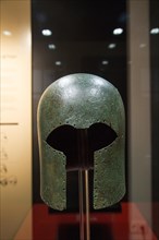 Greek Corinthian bronze helmet, seventh century BC, archaeology museum, Jerez de la Frontera, Cadiz