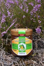 Honey jar, skep of apiary in heather at the Lueneburg Heath, Lunenburg Heathland, Lower Saxony,
