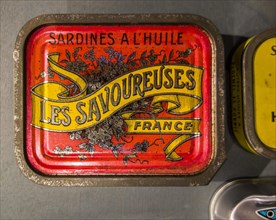 French red sardine tin of Les Savoureuses in the Port Musee, boat museum at Douarnenez, Finistere,