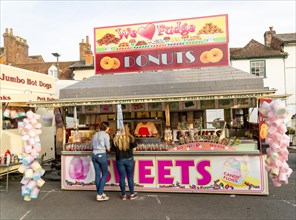 Mops fair fairground, High Street, Marlbrough, Wiltshire, England, UK October 7th 2023, Donuts and