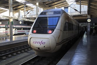 RENFE Alvia train at platform of railway station, Cordoba, Spain, Europe