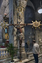 Large Chistus cross on the chancel in the church of San Donato, 12th century, Via S. Donato, 10, in