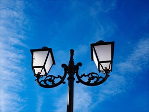 Historic street lamp, blue sky, Roermond, Netherlands