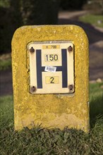 Close up of yellow water hydrant sign, UK