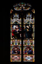 Colourful stained glass window with reformers Johannes Calvin and Huldrych Zwingli, stained glass,