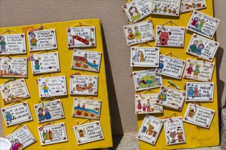 Souvenir boards with Italian sayings, Capoliveri, Elba, Tuscan Archipelago, Tuscany, Italy, Europe