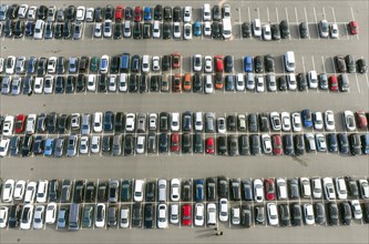 Car park with cars belonging to employees of the Tesla Gigafactory, Gruenheide, 12.11.2022
