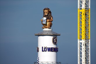 Oktoberfest, afternoon, Lion of the Loewenbraeu brewery on the tower of the festival tent, Munich,