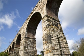 Stone arches of railway viaduct crossing River Tweed, Berwick-upon-Tweed, Northumberland, England,